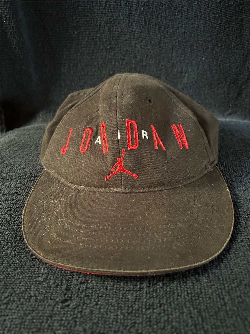 Vintage ‘90’s Nike Air Jordan Black Cap w Red Jumpman & Lettering & Elastic